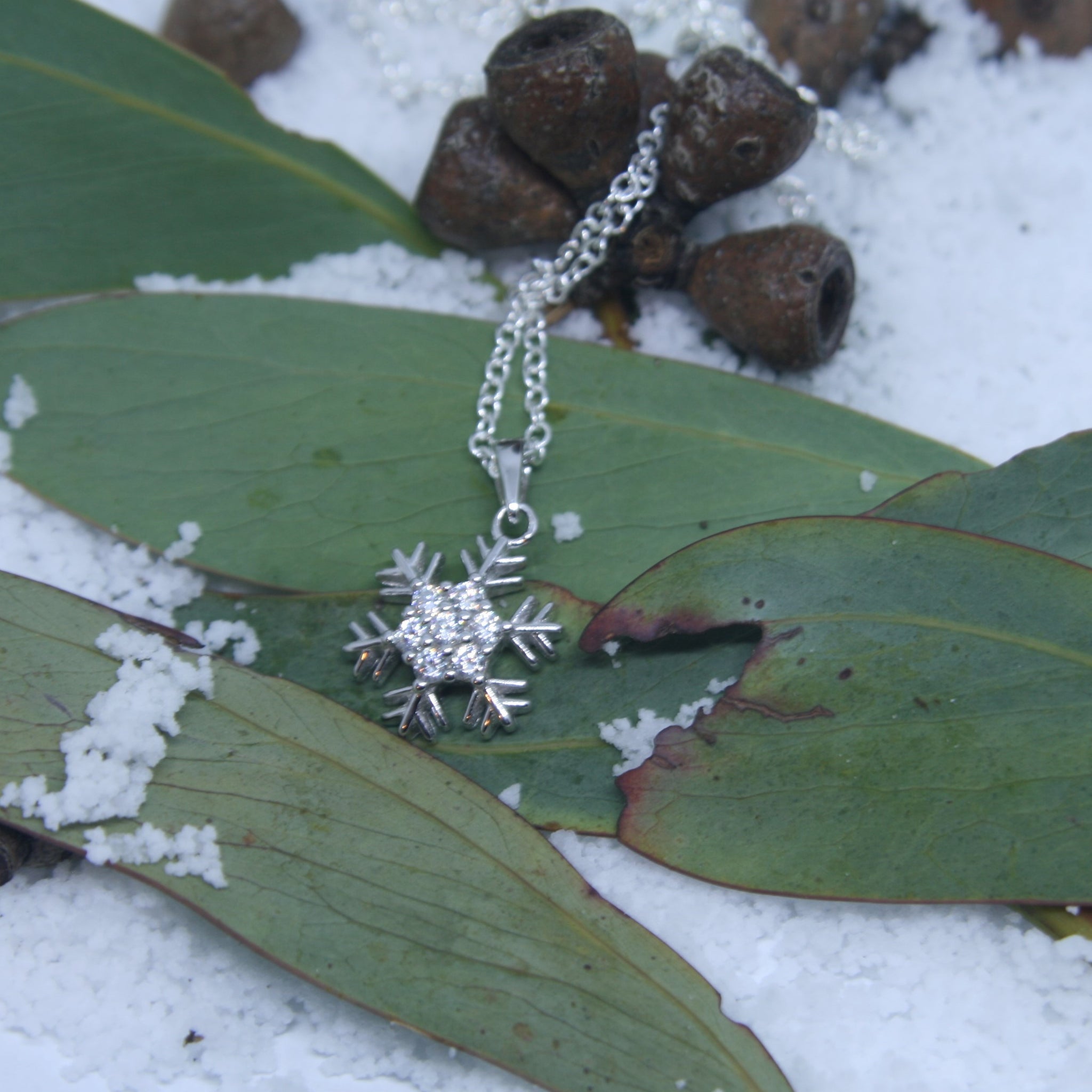 Small Sterling Silver Snowflake Pendant w/- CZ - SXN434